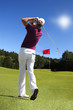 Photo: Man playing golf Man playing golf