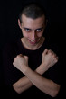 muscular man crossing hands on chest muscular man crossing hands on chest