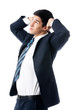 Happy young business man with hands up, isolated on white