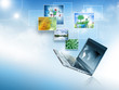 Multimedia concept with modern laptop on green field Multimedia concept with modern laptop on green field