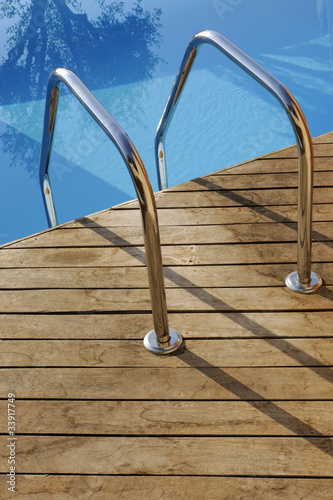 Photo: Swimming pool handrail with teak wood flooring Swimming pool handrail with teak wood flooring