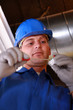 Electrician screwing a piece