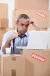 Stressed warehouse worker