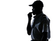 Policeman blowing whistle