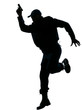 Policeman running with a handgun