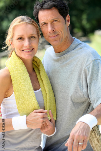 Photo: Portrait of tennis couple Portrait of tennis couple