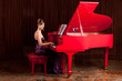 pretty lady playing the piano