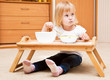 A small girl is eating