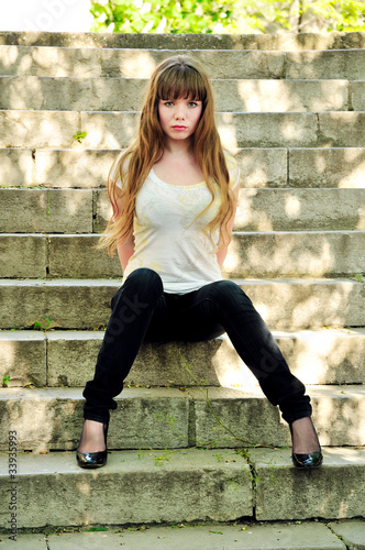 Photo: sad girl on stairs sad girl on stairs