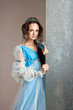Photo: History of fashion design - woman in 16th century style dress History of fashion design - woman in 16th century style dress
