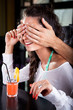 Beautiful attractive girl with cocktail in bar