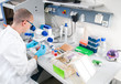 Young scientist works in the laboratory Young scientist works in the laboratory