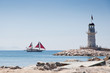 lighthouse and ship
