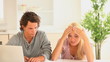 Young couple checking at their account