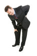 Businessman Suffers with Back Pain