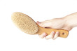 A brown woodem hairbrush