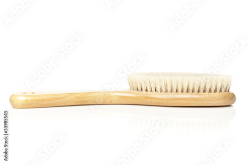Photo: A brown woodem hairbrush A brown woodem hairbrush