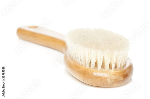 Photo: A brown woodem hairbrush A brown woodem hairbrush