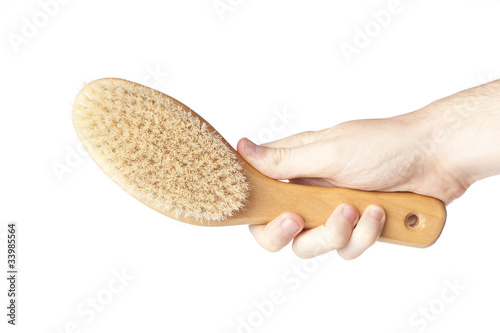 Photo: A brown woodem hairbrush A brown woodem hairbrush