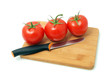 Red  tomatoes on the white background