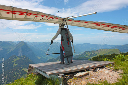 Photo: Hanggliding in swiss alps, Switzerland Hanggliding in swiss alps, Switzerland