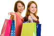 Girls with shopping on white background.