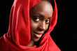 Beautiful black girl in headscarf with happy smile
