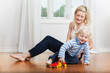 Photo: Mother and child playing Mother and child playing