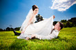 Groom looking under brides dress Groom looking under brides dress