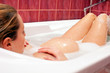 Photo: Young pregnant woman taking a bath Young pregnant woman taking a bath
