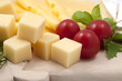 Various types of cheese on a wooden board Various types of cheese on a wooden board