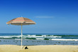 Photo: Beach Umbrella and Sandals Beach Umbrella and Sandals