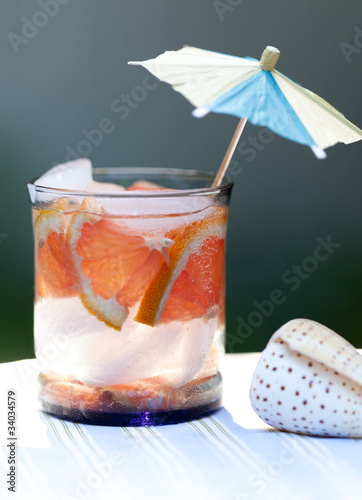 Photo: Orange drink with umbrella Orange drink with umbrella