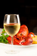 Glass of white wine with cooked lobster Glass of white wine with cooked lobster