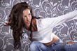 Beautiful young urban woman dancing