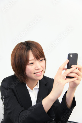 Photo: Princess MAIKO Benicio / Laugh with Smart Phone at Office Princess MAIKO Benicio / Laugh with Smart Phone at Office