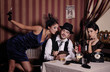 Gambling mafia type with cigarette, playing poker.