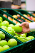Man in supermarket shopping groceries