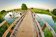 Wooden bridge over the small river