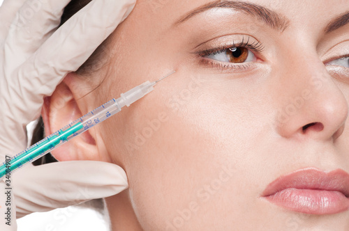 Photo: Cosmetic botox injection in the beauty face Cosmetic botox injection in the beauty face