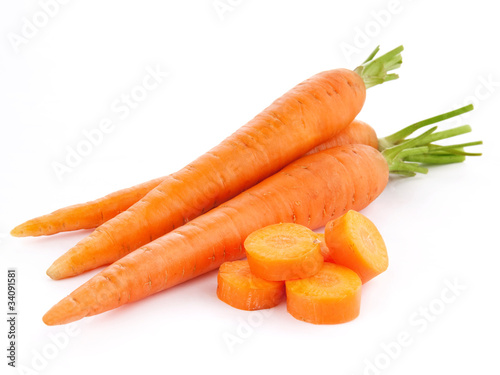 Photo: fresh carrots isolated on white background. fresh carrots isolated on white background.