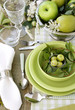 Summer table setting with green dinnerware