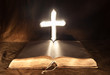 Mysterious Cross above Bible