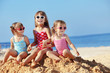 Photo: Kids playing at the beach Kids playing at the beach