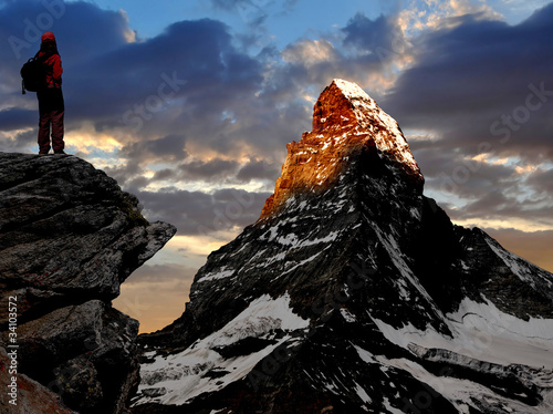 Photo: girl looking at the beautiful Mount Matterhorn girl looking at the beautiful Mount Matterhorn