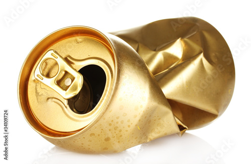 Photo: crumpled empty tin can isolated on white crumpled empty tin can isolated on white