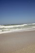 Beautiful view of beach against clear sky