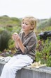 Girl playing with shells