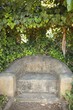 Stone seat in a garden