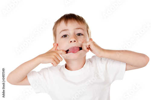Photo: Boy pulling funny face Boy pulling funny face